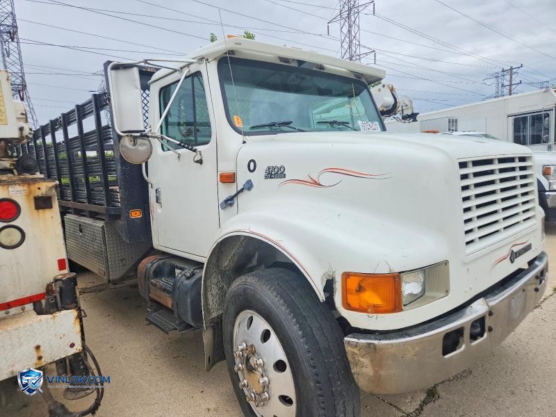 2000 INTERNATIONAL 4700 FLATBED TRUCK – Lot 55042046 auction photo