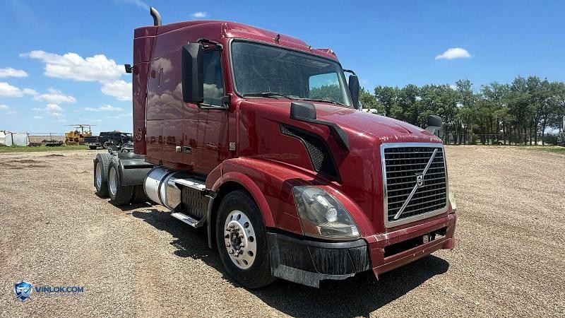 2014 VOLVO VNL SEMI TRUCK – Lot 58635696 auction photo