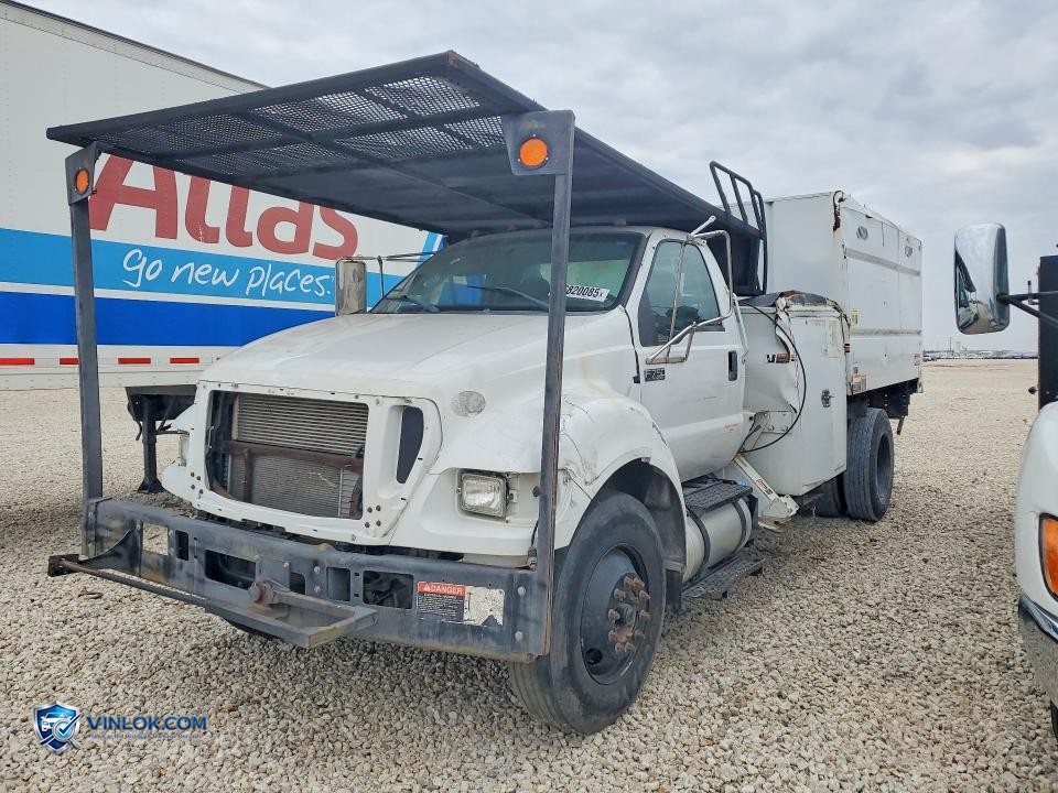 2015 FORD F750 SUPER DUTY CHIPPER TRUCK – Lot 76820085 auction photo