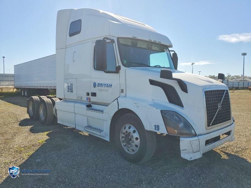 2014 VOLVO VNL SEMI TRUCK – Lot 76956585 auction photo